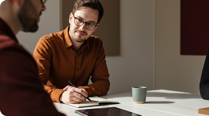Man on phone with calendar
